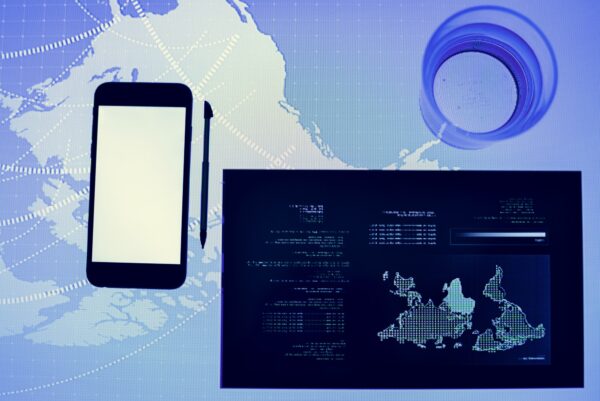 Smartphone on a cyber space table